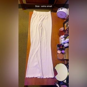 Crème colored ribbed and flared bottoms